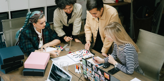 Symbolbild für Co-Founder:innen: 4 Personen stehen an einem Tisch und schauen sich Farbmuster an