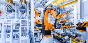 Blick in eine Halle mit Maschinenrobotern, passend zum Thema ROBOTICS AWARD